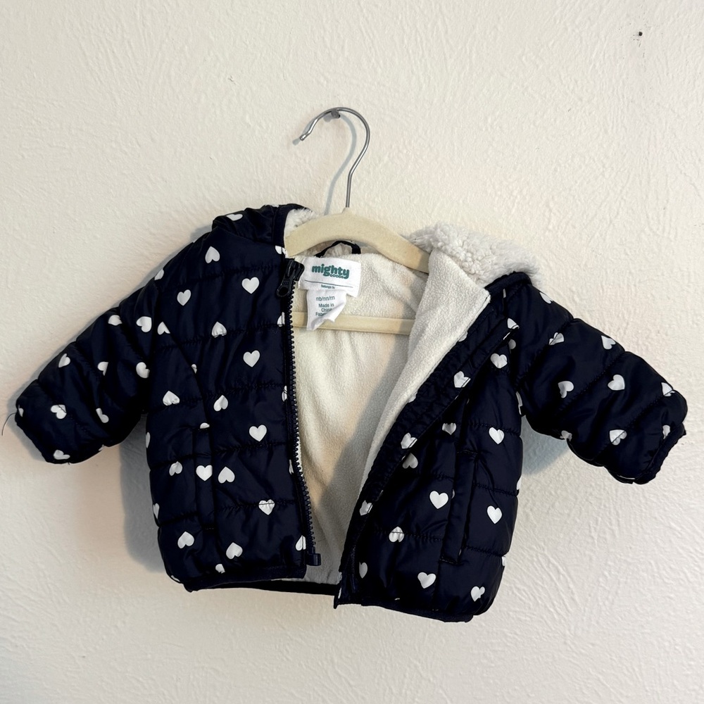Newborn girls puffer coat. New without tags. Never worn.